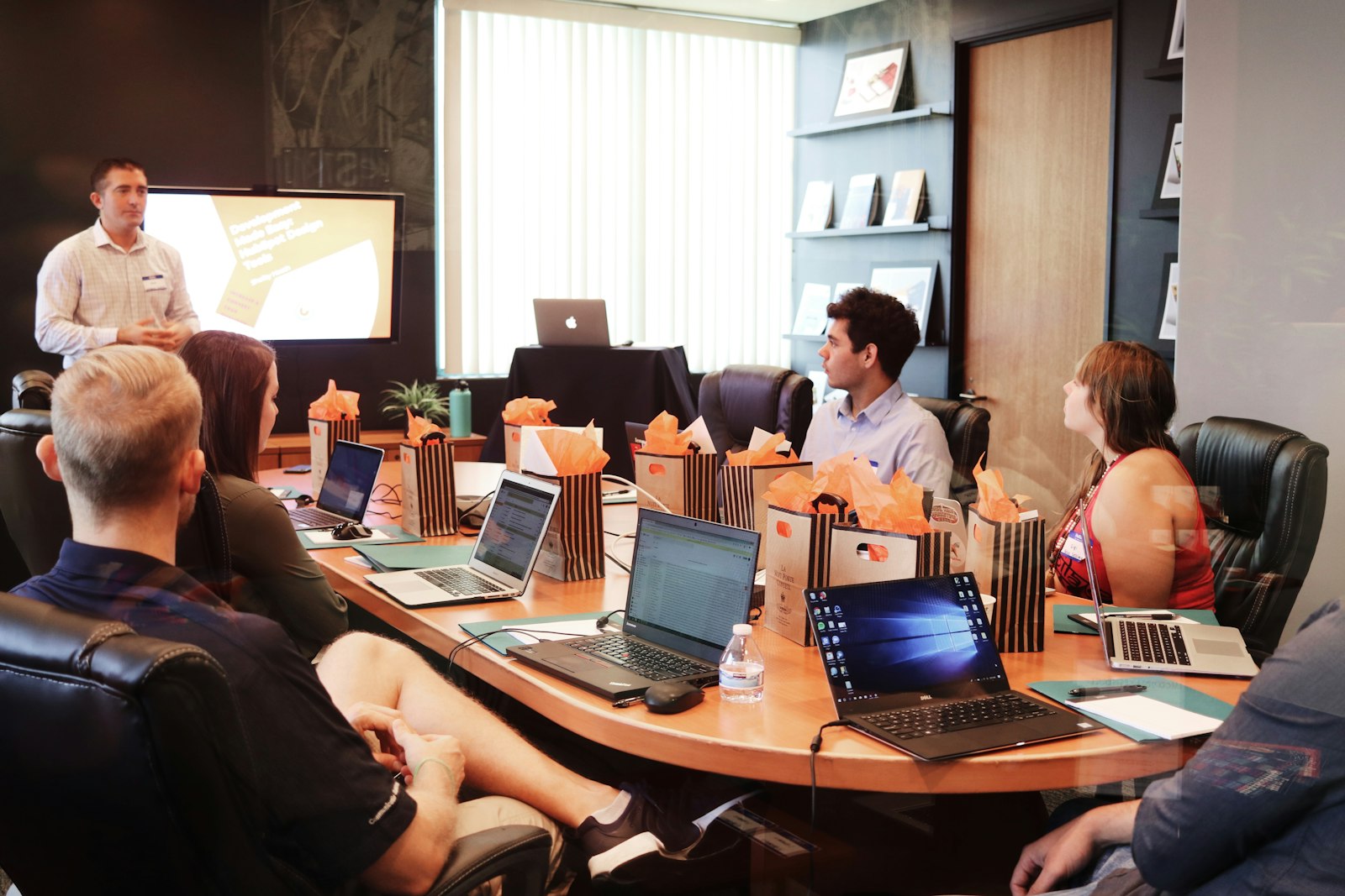 Team in a conference room during a hands-on AI training session