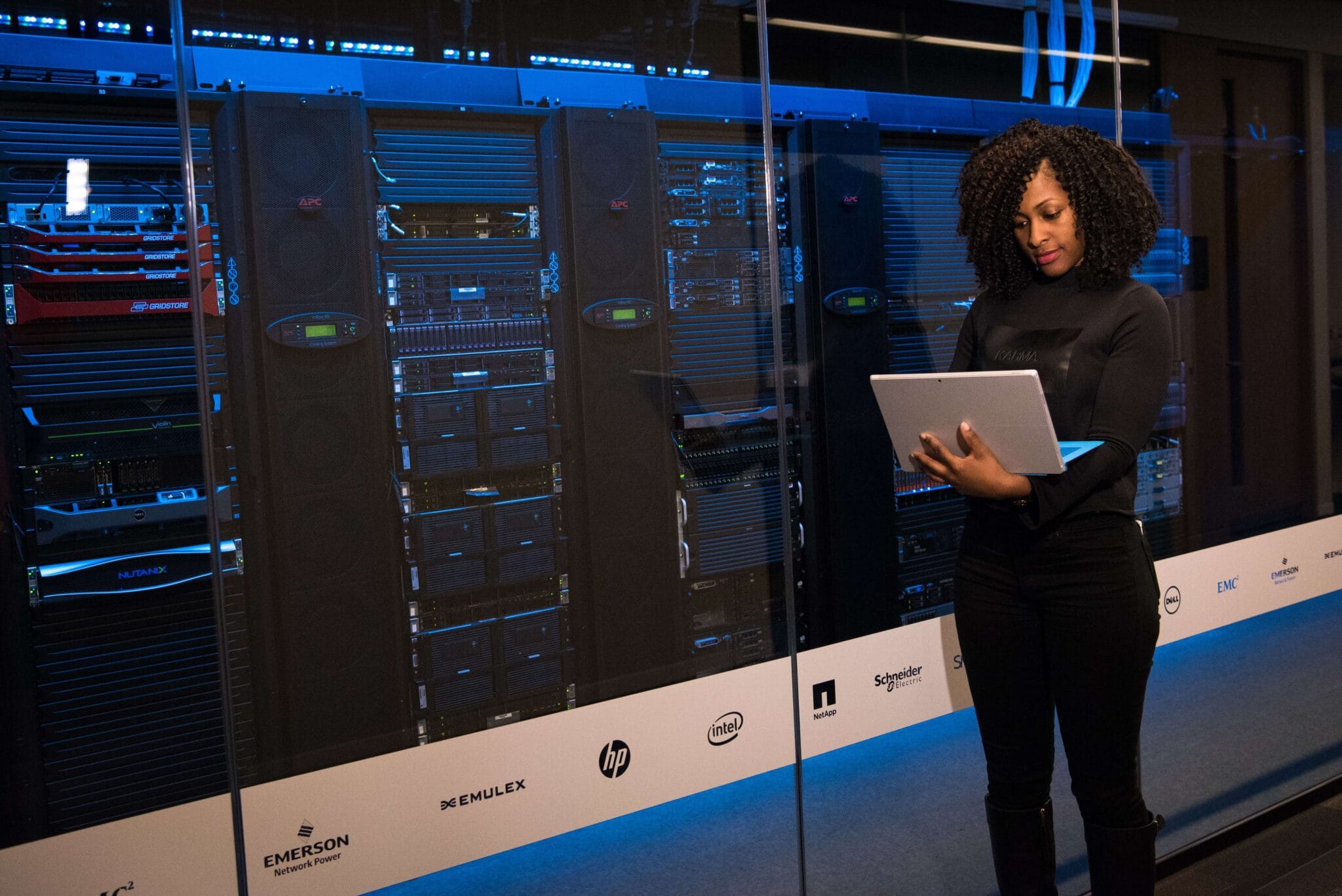 Engineer reviewing systems in a secure data center